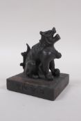 A Chinese bronzed metal archaic style seal with kylin knop, 8 x 8cm