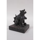 A Chinese bronzed metal archaic style seal with kylin knop, 8 x 8cm