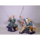A pair of oversized Chinese 'mudmen' glazed  terracotta figures of fishermen, 80cm high