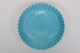 A turquoise glazed porcelain dish of petal form, Chinese YongZheng seal mark to base, 18cm diameter
