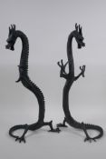 A pair of Chinese bronzed metal dragons, 40 cm high