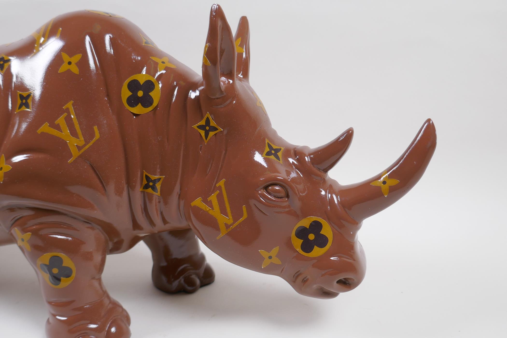 A painted composition rhino with LV style decoration, 52cm long - Image 2 of 3