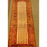 An Iranian fine woven cream ground wool runner with Mir design, 260 x 100cm