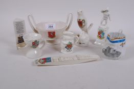 A collection of crested ware, Margate, Ramsgate, Eastbourne, etc, and a Norwich Warbler whistle,
