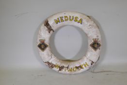 An antique cork and canvas lifebuoy, the Medusa, Weymouth, 74cm diameter
