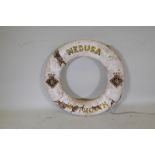 An antique cork and canvas lifebuoy, the Medusa, Weymouth, 74cm diameter