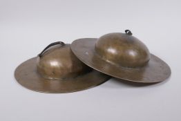 A pair of Tibetan brass ceremonial 'Rol Mo' cymbals, 24cm diameter