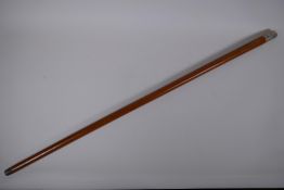 A white metal topped cane, 87cm long