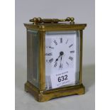 A brass cased glass carriage clock with enamel dial, glass chipped, dial cracked, 12cm high