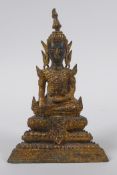 A Thai gilt bronze figure of Buddha, 16cm high