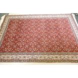 A terracotta ground wool pile Turkish Erikeh rug with all over design,200 x 290cm