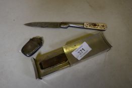 A C19th Corsican Vendetta Knife with inscribed blade and penwork decorated handle, a silver vesta
