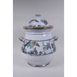 A C19th Staffordshire porcelain two handled jar and cover with hand finished transfer decoration