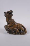 A Chinese bronze figure of a prowling tiger, 4 character inscription to side, impressed Xuande 6