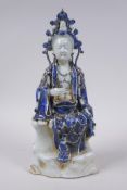 A Chinese blue and white porcelain figure of Quan Yin, 29cm high