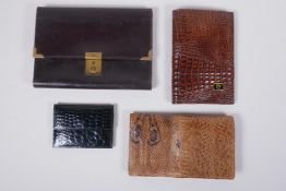 An Italian Fendi leather document wallet, a snake skin wallet and two imitation animal skin