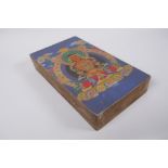 A Sino Tibetan printed concertina book containing thangka depictions, 17 x 29cm