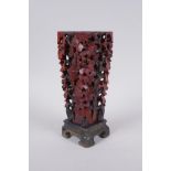 A Chinese carved soapstone vase with pierced grape vine decoration, AF repair, 20cm high