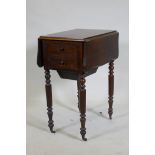 A William IV rosewood workbox, with shaped drop flaps, two drawers and pull out well, raised on