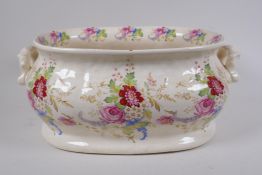 A Staffordshire two handled footbath with floral spray transfer decoration, 43 x 32cm, 19cm high