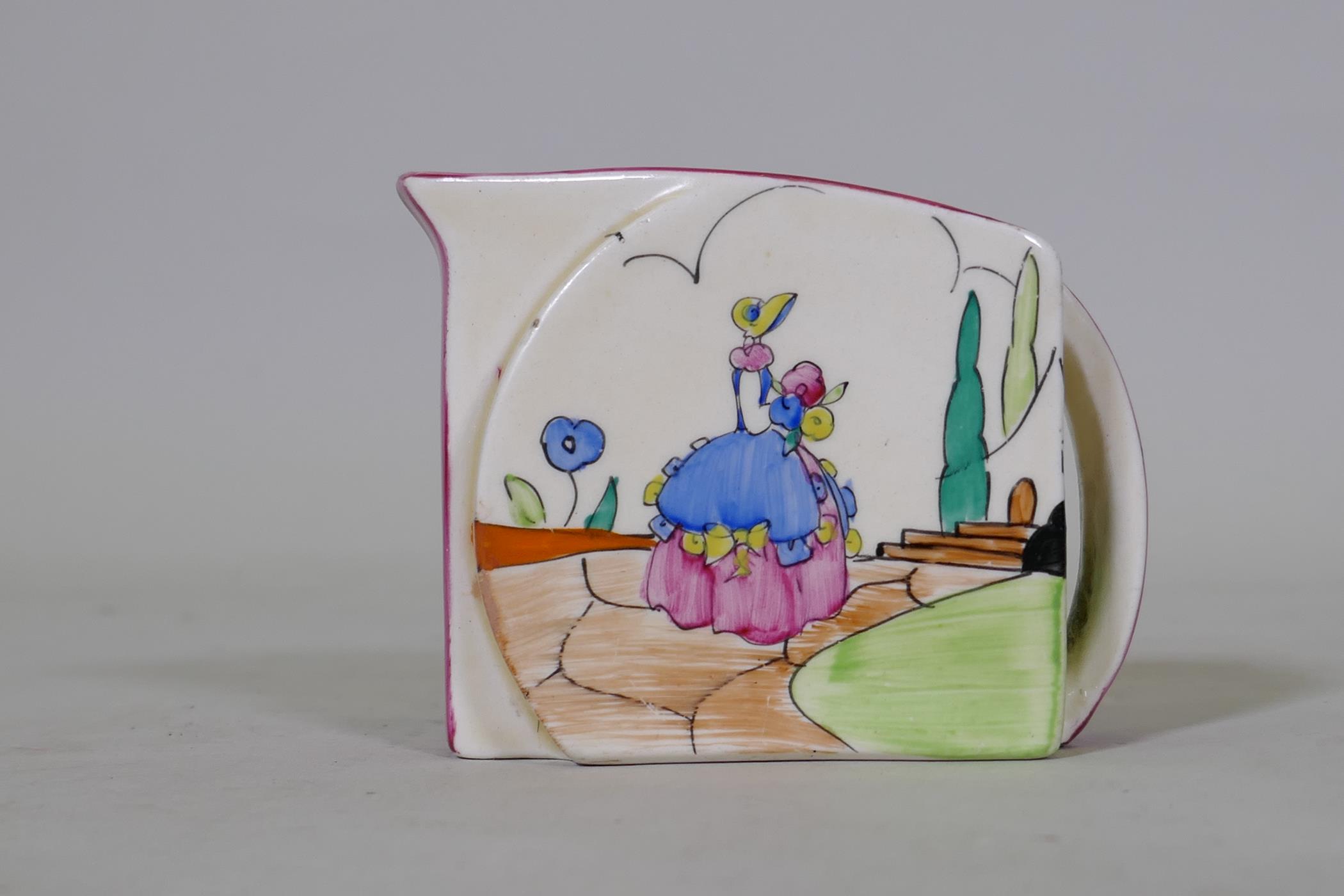 A Clarice Cliff Bizarre Stamford shape milk jug, Idyll pattern decoration, marked to base, 6.5cm
