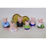 A set of six Wade NatWest ceramic piggy banks, and a Beswick planter, 32cm long