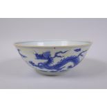 A Chinese blue and white porcelain bowl with dragon decoration, Chenghua 6 character mark to base,