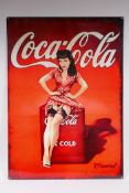 A vintage style metal Coca-Cola advertising sign, 50 x 70cm