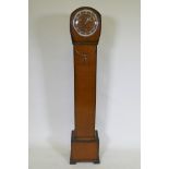 A 1960s Smiths grandmother clock, the eight day movement striking the Westminster chimes, with