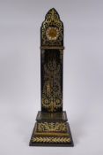 A C19th miniature wall clock in a boulle work case, with brass dial, enamel numerals and a weight