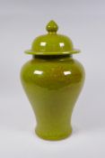A Chinese lime green crackleware Meiping jar and cover, 35cm high