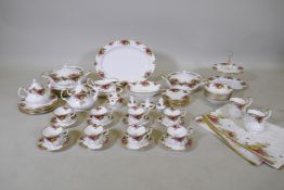 A Royal Albert 'Old Country Rose' eight place tea set and matching six place dinner service and