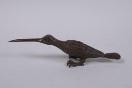 A Japanese bronze okimono of a long beaked bird, 14cm long