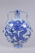 A blue and white porcelain two handled moon flask with dragon decoration, Chinese Xuande 6 character