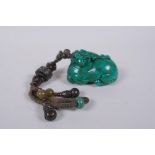 A Chinese imitation turquoise kylin pendant/toggle, 7cm long