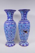 A pair of C19th Islamic Multan terracotta vases with blue Kashigari designs, AF, 46cm high