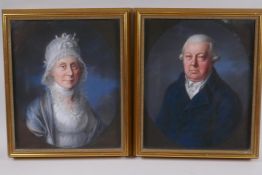 A pair of C19th German pastel portraits of a lady and gentleman, 28 x 34cm