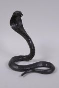 An oriental bronze figure of a cobra, 18cm high