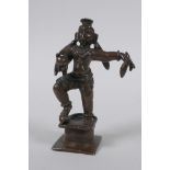 An antique Indian bronze figure of a dancing figure, 10cm high