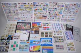 A large quantity of Mint World Stamps including Iraq, Venezuela, New Zealand, Ascension Island,
