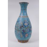 A Japanese Meiji period cloisonne on porcelain pear shaped vase with floral and butterfly
