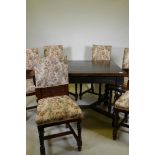 A set of six C19th continental oak dining chairs, with carved panel backs and sprung seats, raised