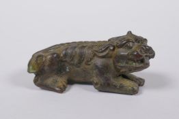 A Japanese bronze okimono kylin signed, 7cm long