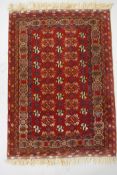 A Persian reg ground wool rug with geometric design, 108 x 148cm