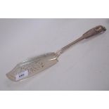 A Victorian silver fish slice with pierced blade and King Edward pattern decoration, London 1856,