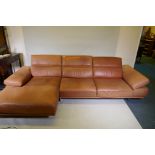 A Natuzzi leather corner sofa in two sections, with adjustable arms and backs, 316 x 160 x 90cm with
