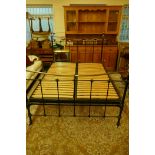 A John Lewis metal and brass king size bed, 150 x 210cm