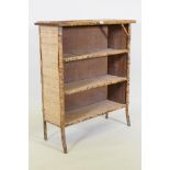 A bamboo and rattan three tier open bookcase, 88 x 32cm, 100cm high