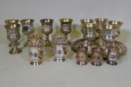 A quantity of silver plated mugs and goblets, 15cm high, and tray
