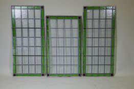 Three leaded and stained glass windows, largest 50 x 112cm